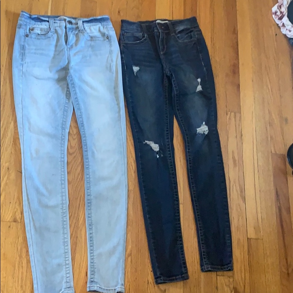 Two pairs of skinny jeans.